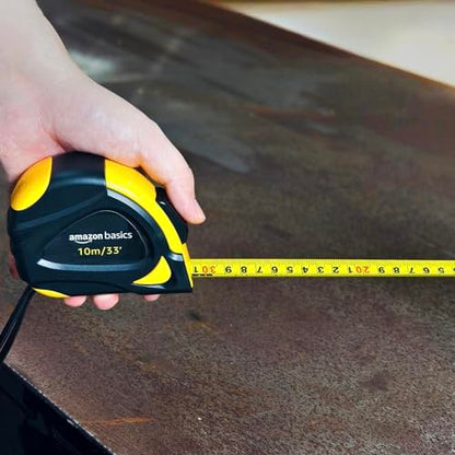 Amazon Basics Self-Locking Tape Measure with Belt Clip, 33 feet (10 m), Inch/Metric Scale, MID Accuracy, Black, Yellow - color: Black, Yellow, size: 10.1 m